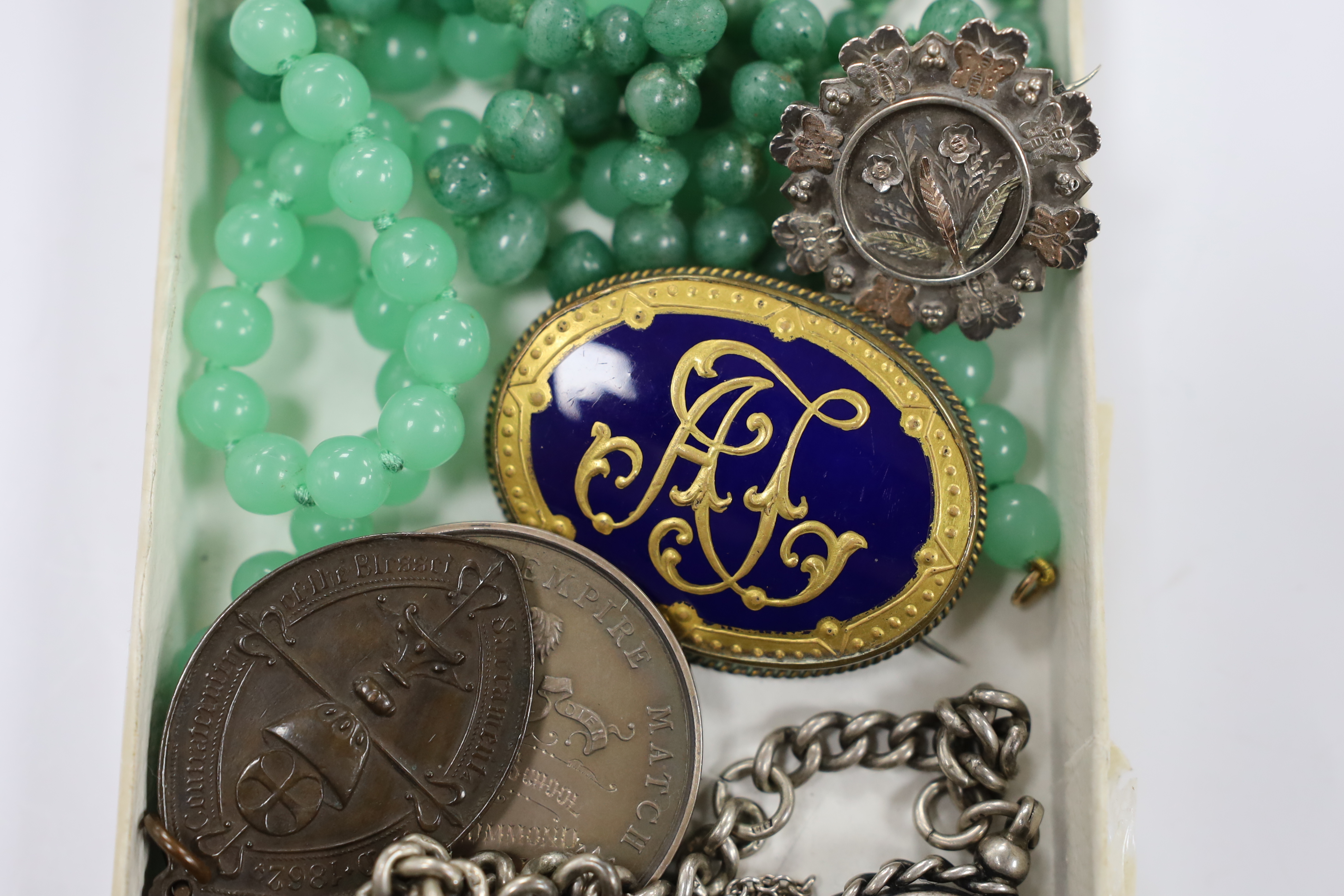 Sundry jewellery etc. including two simulated jade necklaces, a late Victorian silver brooch, a silver compass fob on a silver albert and an Art Nouveau style enamelled white meal drop pendant.